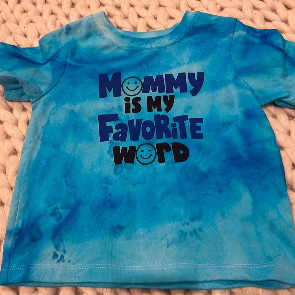 Short sleeve, blue tie-dye T-shirt, saying mommy is my favorite word